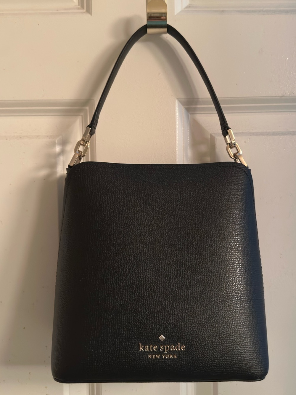 Kate Spade Small Darcy Bucket Bag in black pebbled leather with gold hardware